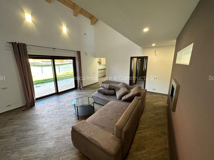 CASA SPATIOASA  CU GARAJ SI TEREN DE 600 MP - 2