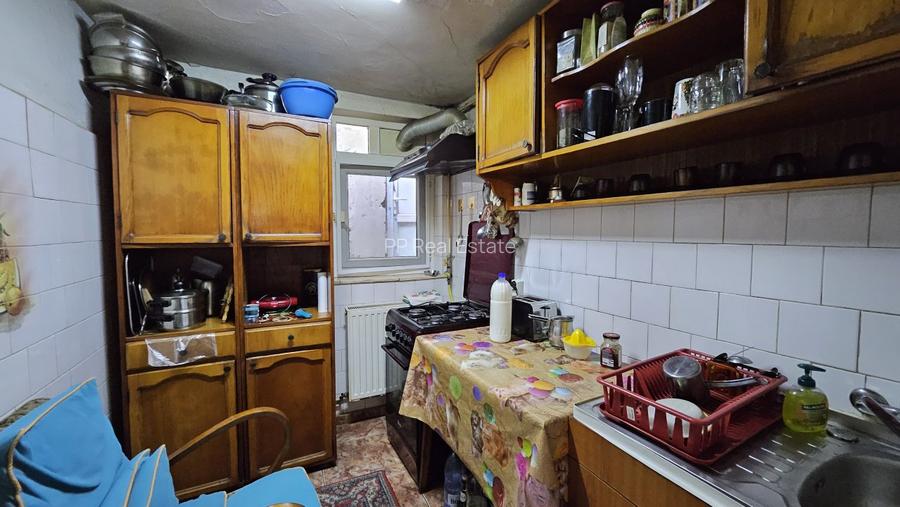 Piata Amzacea - casa 3 camere (suprafata totala teren 114 mp ) - 16