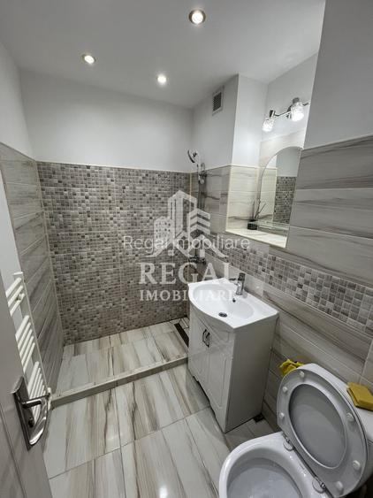 Garsonieră de închiriat – modernă, complet utilată, în zona centrală - 7