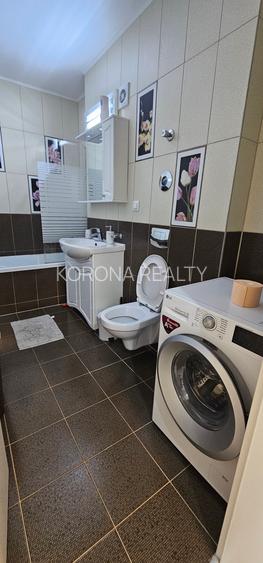 Apartament de vanzare cu 3 camere zona Tractorul bloc nou - 24