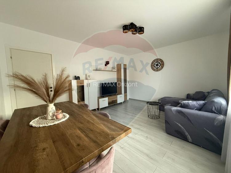 Apartament cu 3 camere, 2 bai și loc de parcare - 40