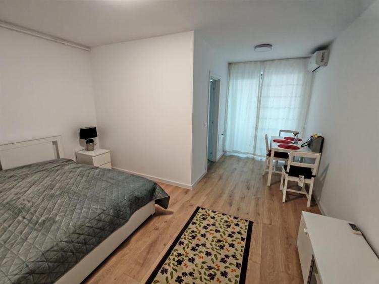 Inchiriere garsoniera si loc de parcare in Hills Titanium