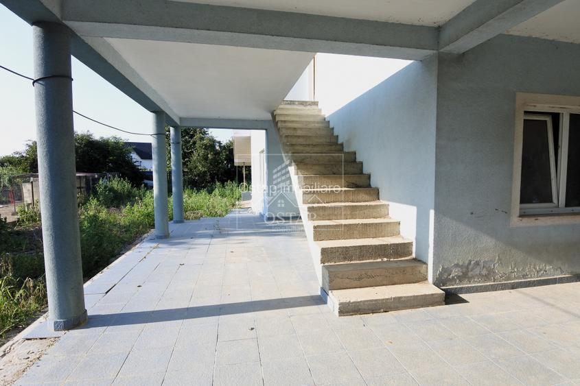 Șerbanesti - strada Siretului - vila la gri - P+M - teren 1.000 mp - 4