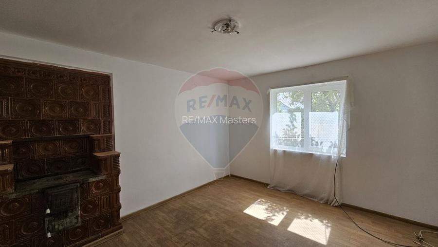 Casă  cu 3 camere, teren intravilan de 1300mp în Ipotești Tișăuți, SV - 14