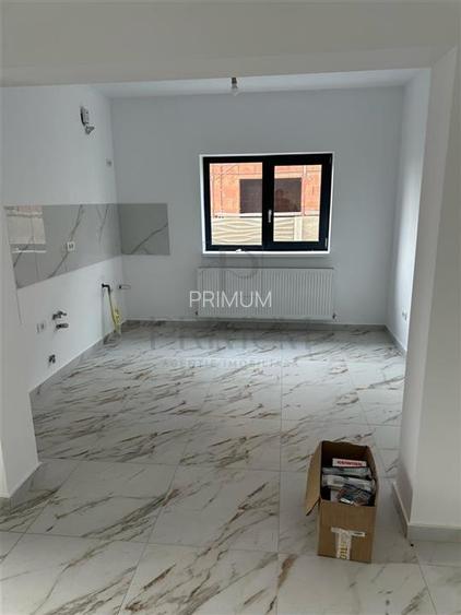 Duplex spatios - bucatarie inchisa - zona linistita - teren 375 mp - 12