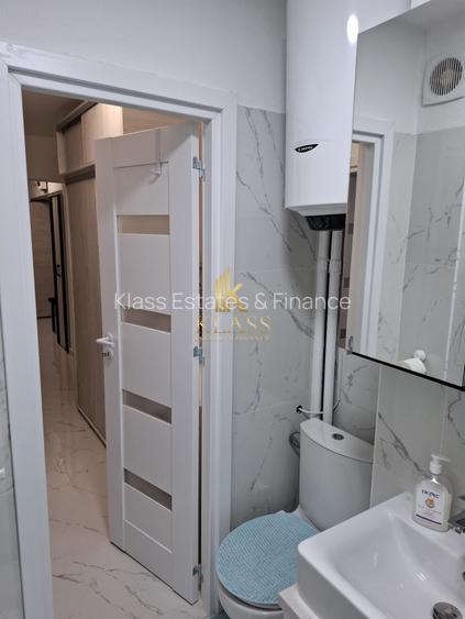 de inchiriat apartament decomandat cu 3 camere  in zona P-ta Victoriei - 15