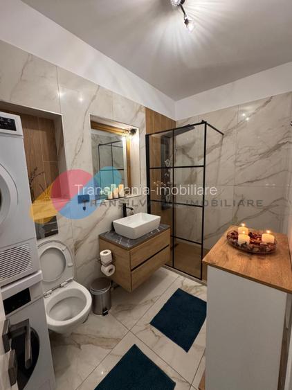 Apartament 54mp, balcon, utilat, zona Floresti - 11