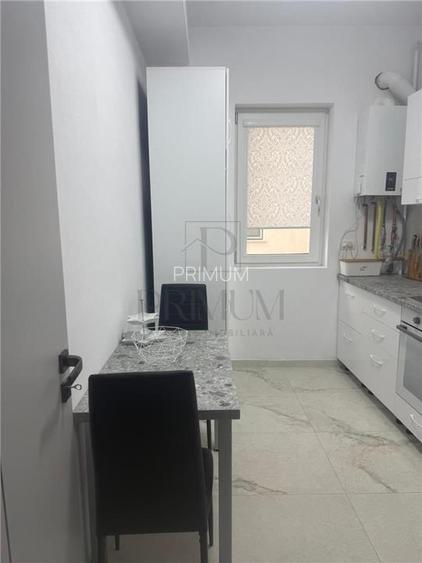 GIROC - 2 CAMERE - ETAJUL 1 - DECOMANDAT - MOBILAT SI UTILAT - PARCARE INCLUSA - 7