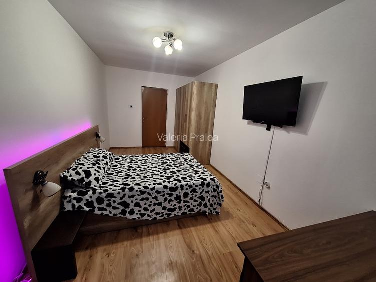 Închiriez apartament spatios cu 2 camere,parter,zona Calea Moldovei,parcare incl - 7