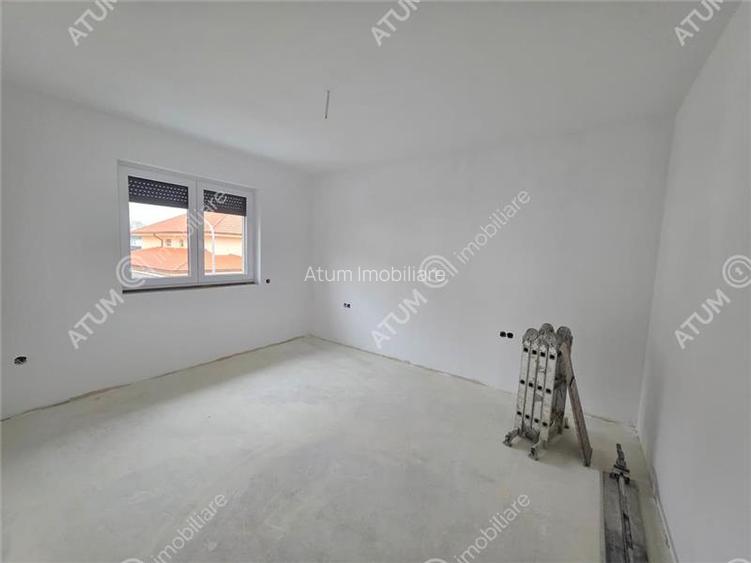 Casa individuala cu 4 camere si curte libera de 330 mp in Selimbar - 13