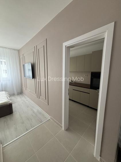 Garsoniera de inchiriat –Dotari: - TV +  loc  de parcare - 10