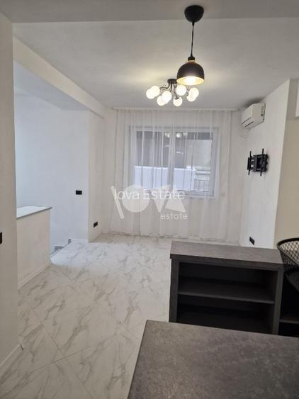 Pentru inchiriere Duplex 5 camere ( Parter + Demisol ) in vila Piata Romana - 7