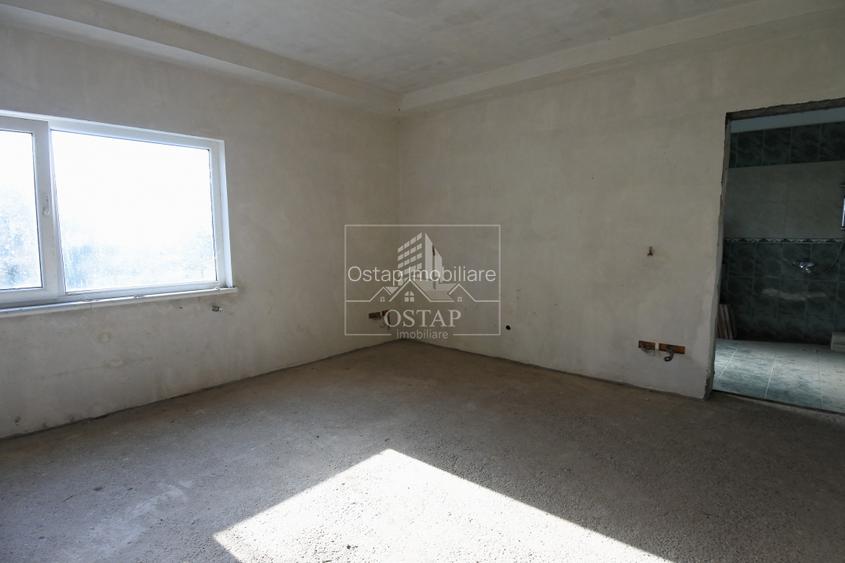 Șerbanesti - strada Siretului - vila la gri - P+M - teren 1.000 mp - 8