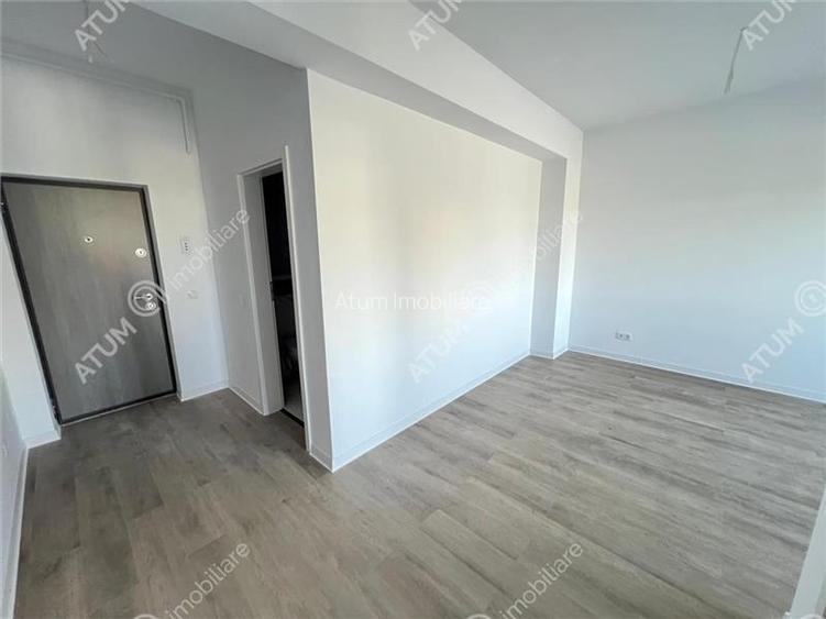 Garsoniera cu balcon si parcare de vanzare in Selimbar zona Brana - 19