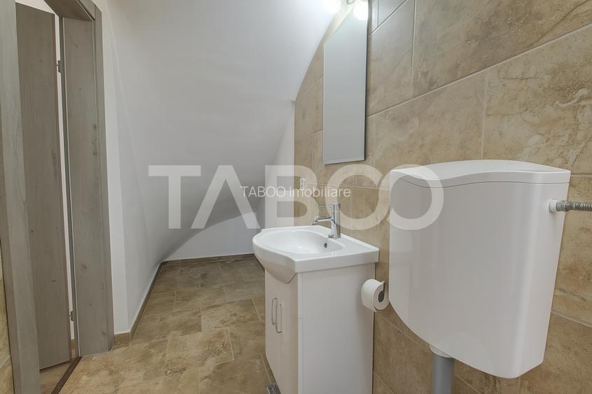 Casa de vanzare in Zavoi cu 3 camere 2 bai curte libera de 50 mp - 13