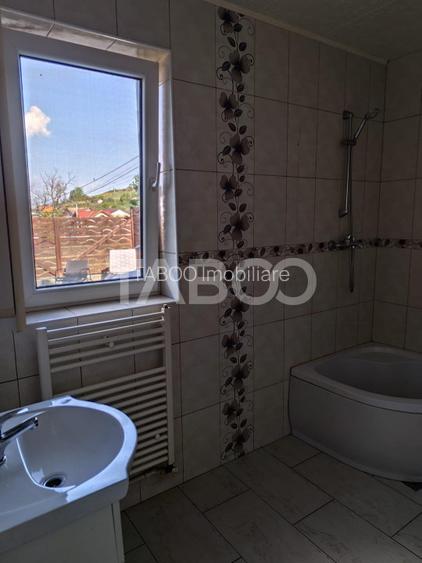 Casa cu garaj si curte de vanzare 147 mpu in Sura Mare - 9