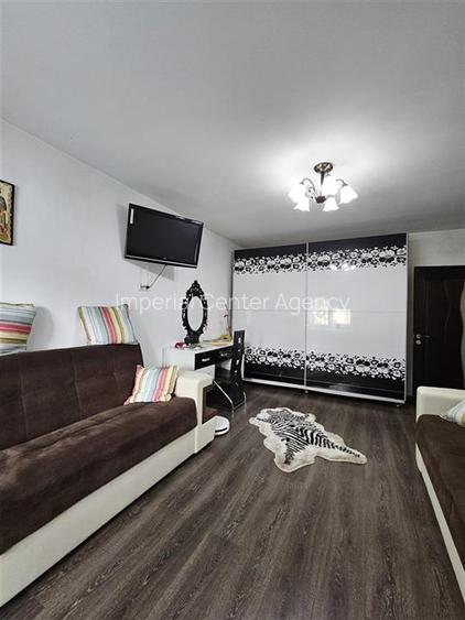 IN EXVLUSIVITATE APARTAMENT 2 CAMERE PARTER DE VANZARE IN ONESTI - 2