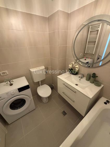 Garsoniera de inchiriat –Dotari: - TV +  loc  de parcare - 11