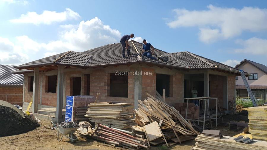 Casă la cheie pe 1 nivel 4cam. 2 bai,1 dresing 650 mp. teren - 11