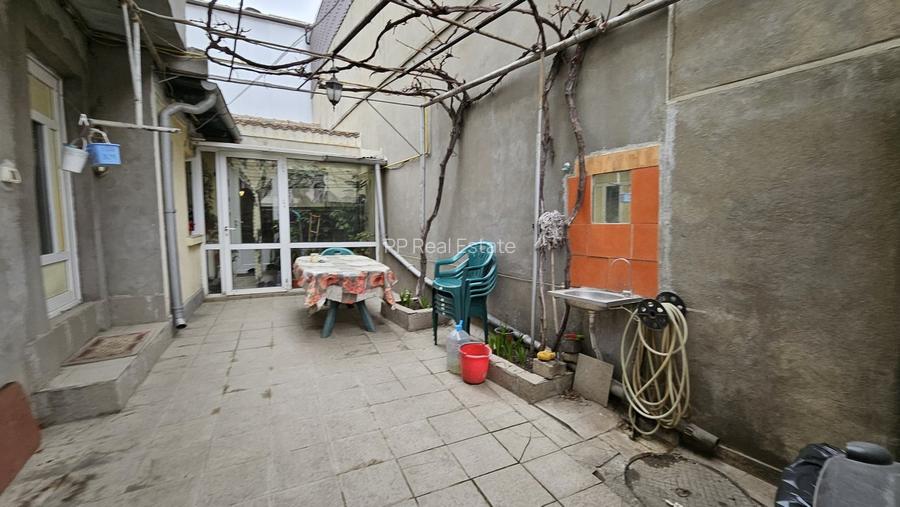 Piata Amzacea - casa 3 camere (suprafata totala teren 114 mp ) - 11