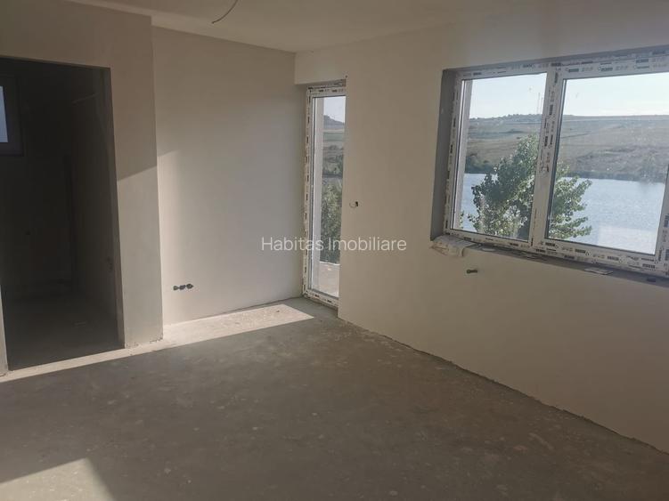 Casa individuala cu terasa,panorama spre lac, garaj, teren 300mp - 6