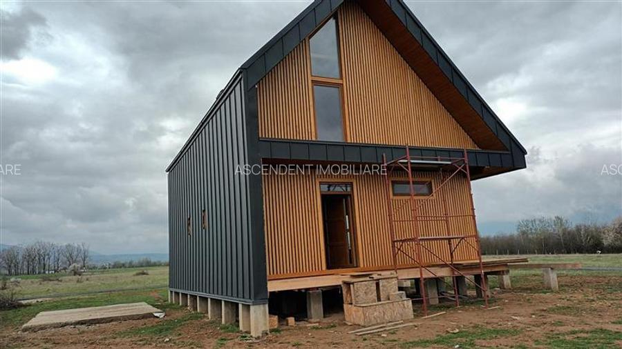 FILM!Casa ergonomica,independenta energetic,123 mp utili,777 mp teren, Rasnov, P - 11