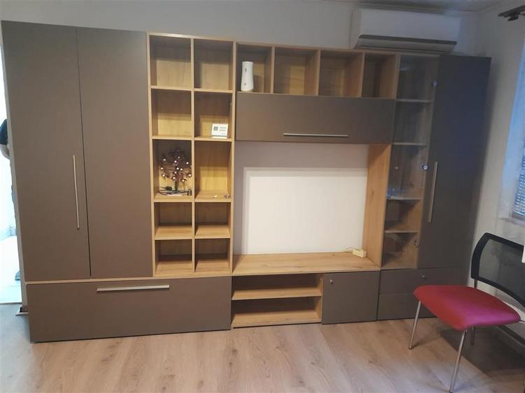 ...Apartament 2 Camere Etaj 1 cu Centrala zona Sagului..