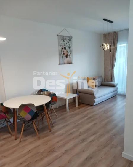 Studio la ertaj intermediar, cu balcon si parcare subterana, situat in Tractorul
