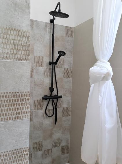 Apartament la curte cu loc de parcare