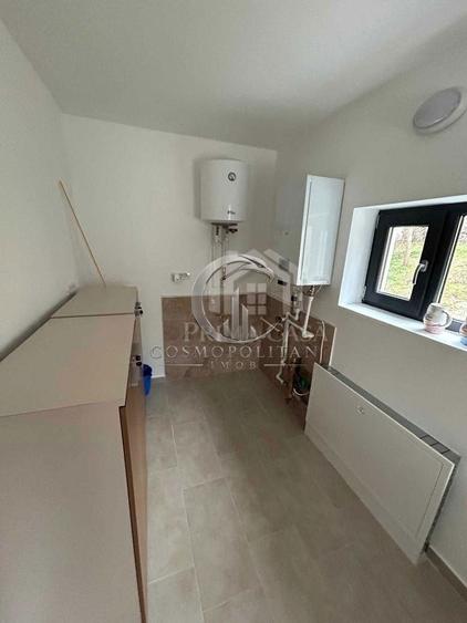 Casa constructi noua si teren 750mp comuna Unguriu BZ finisaje moderne