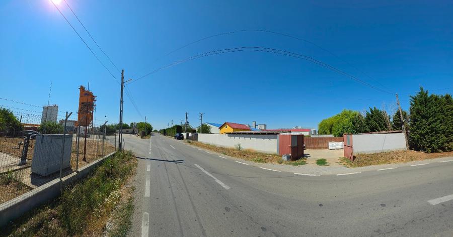Teren intravilan 4000 mp. cu platformă industrială, cântar, hală, clădire.