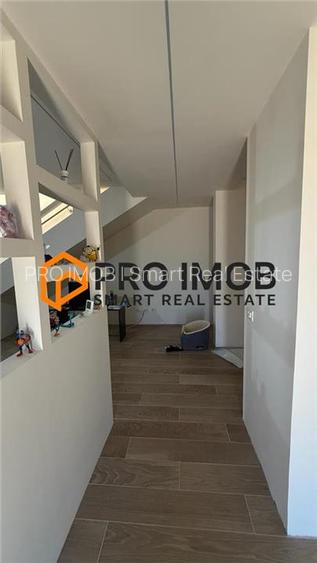 Casa tip P+M si garaj zona Spataru - Costesti - 10