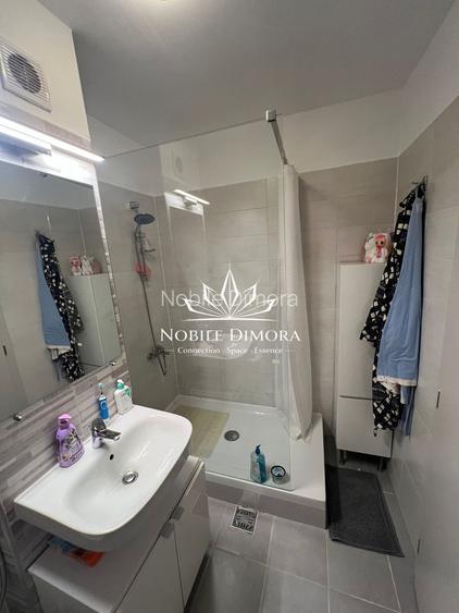 City of Mara - Apartament decomandat cu 2 camere, 2 bai, dressing - central - 13