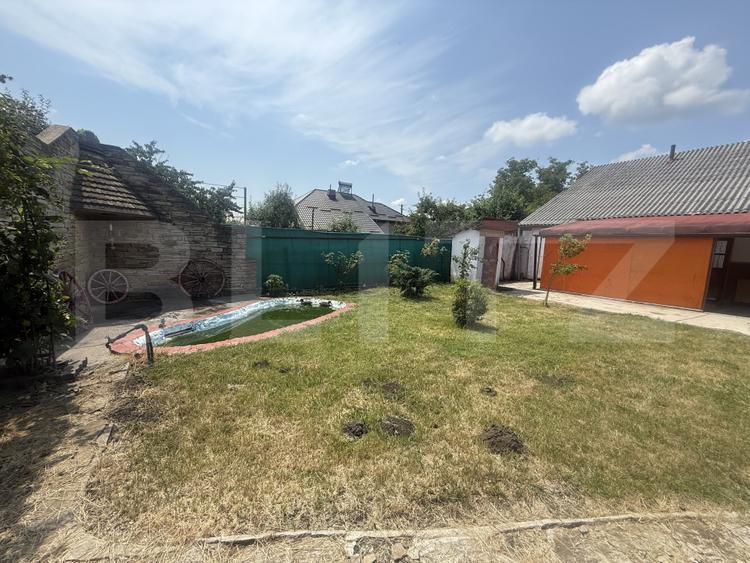 Casă spațioasă, 294 mp, 1.692 mp teren, garaj, terasă și grădină – Voinești
