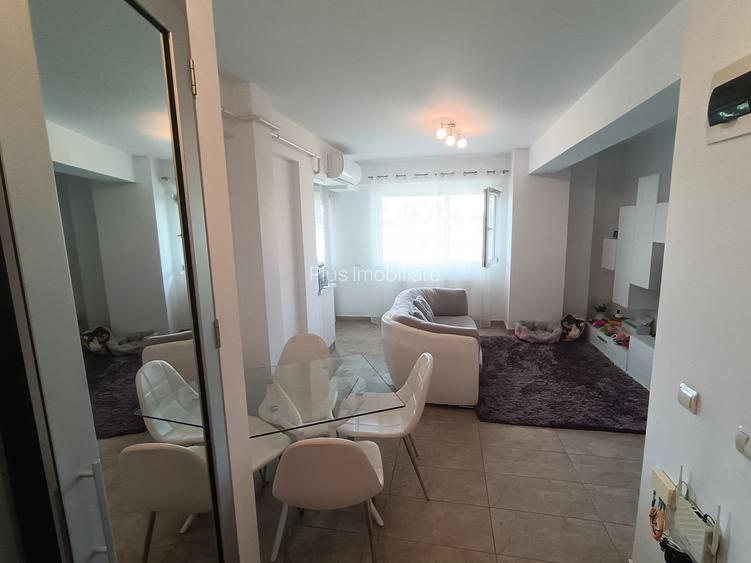 Apt 2 cam. 49.81 m.p. mobilat si utilat, loc de parcare subteran+boxa-33.03 m.p. - 14
