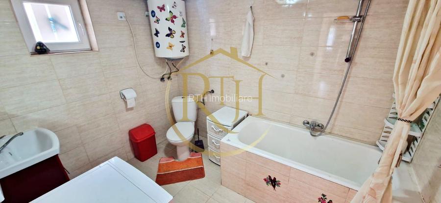 Vand casa recent renovata cu 900 mp curte si gradina in Carpinis - 9