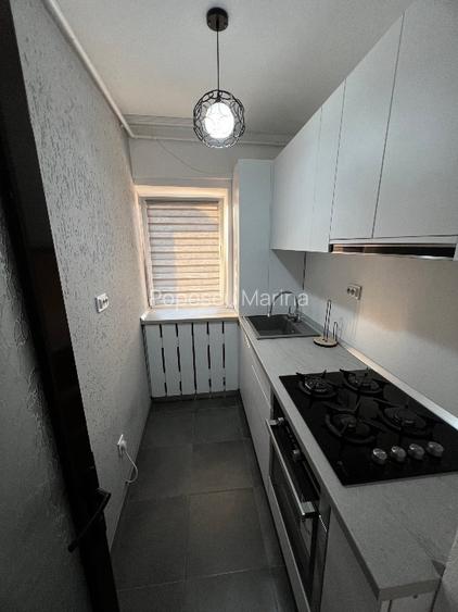 Vând garsoniera complet mobilata si utilata - 8