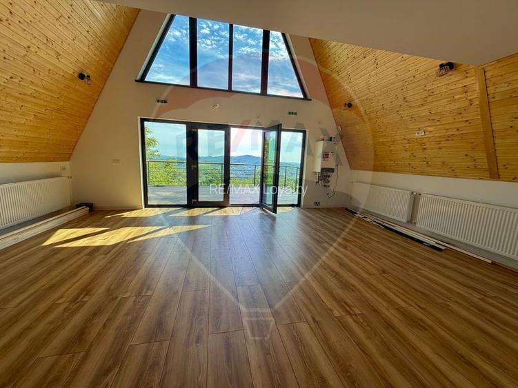 De vanzare Cabana A-Frame cu 1850 mp teren in zona Pucioasa, DB - 2