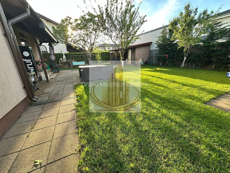 Casă premium cu panouri solare, stație EV, anexă locuibilă și grădină - 23