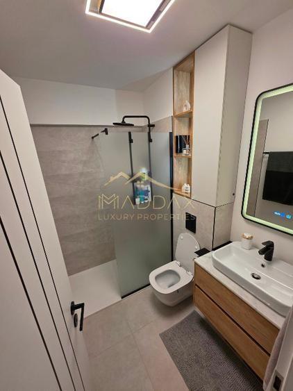 Apartament complet renovat – parcare subterana si boxa