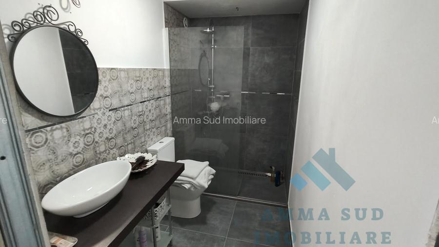 Spatiu comercial subsol - 128.6 mp utili - 3 locuri parcare - 12