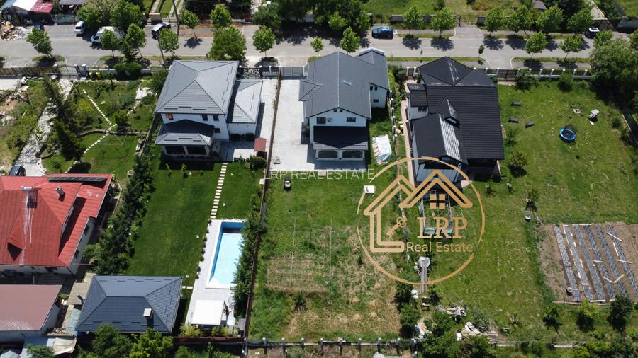 Buftea-Vila individuala 4 camere,3 bai, P+1E, 270mp utili, teren 990mp - 56