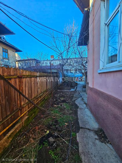 Casă cu arhitectură interbelică, 5 camere, teren 409 mp – Central - 52