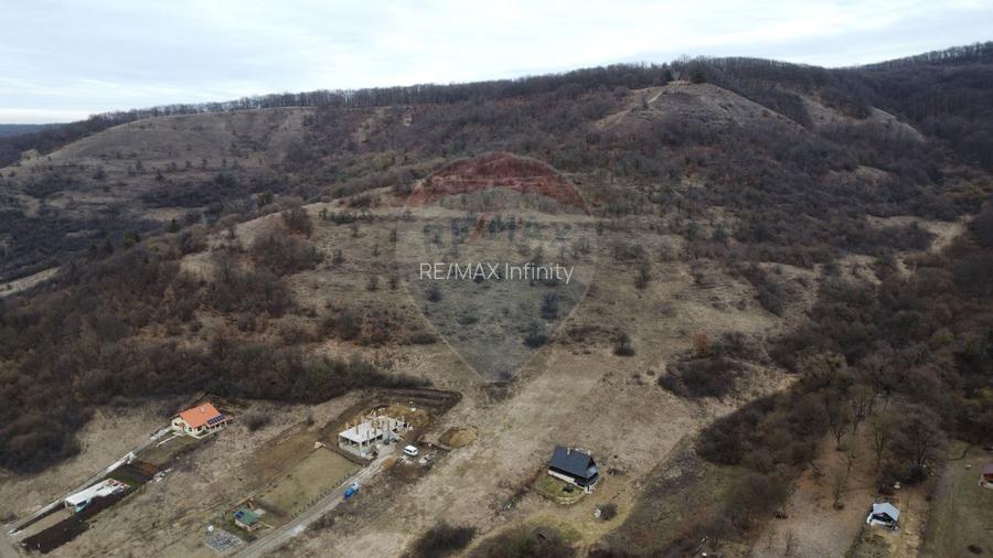 Teren 999 mp. Front 15,70 ml. Valea Garbaului - Floresti - 17