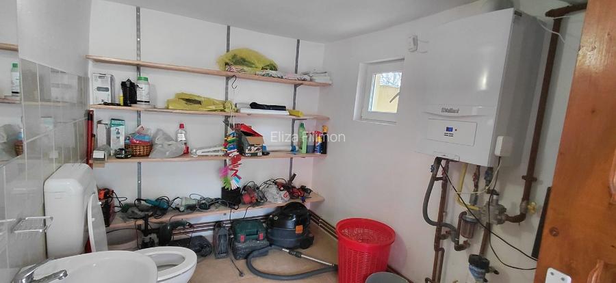 Casă individuală 4 camere 123,4 mp construiți + 76 mp anexe pe un teren de 588 m - 13