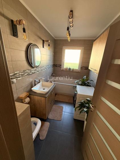 Casa mobilata si utilata cu garaj + foisor, curte amenajata,110 mp, 375mp teren  - 10