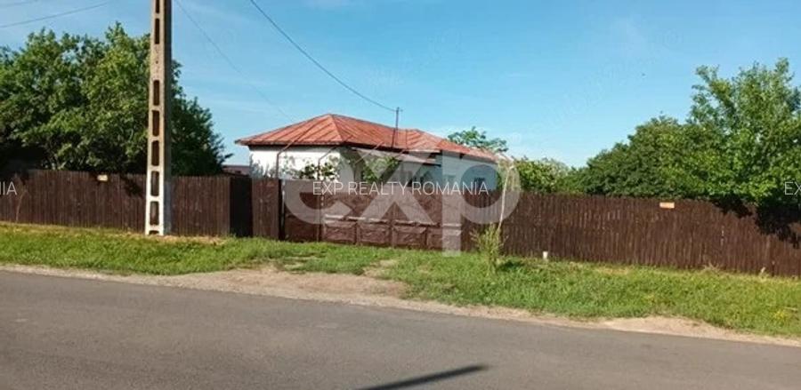 Casă la țară de vânzare – Buzoesti, Argeș | Ideală pentru locuit sau relaxare - 9