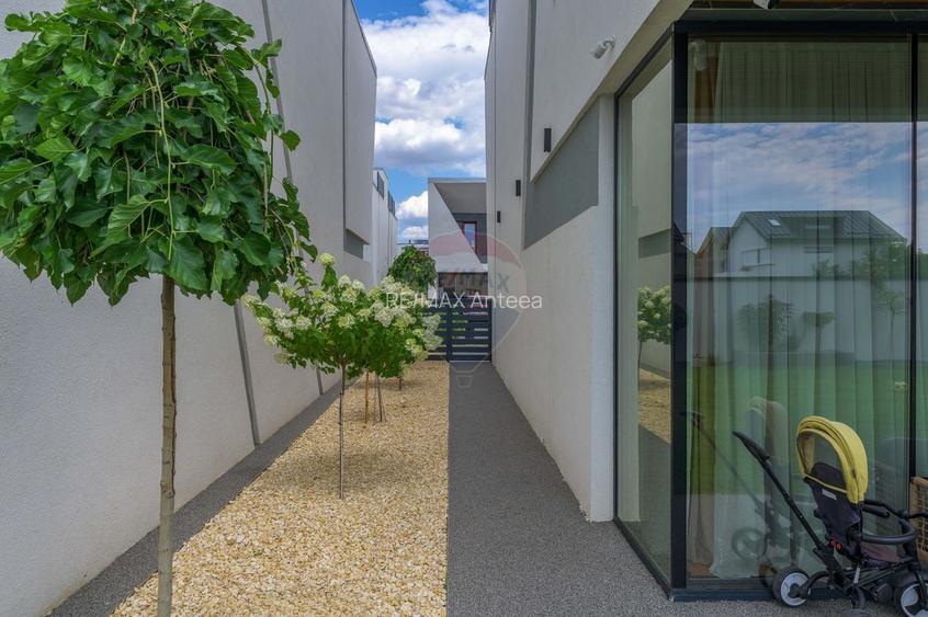 Arhitectură, tehnologie și lifestyle premium într-o vilă spectaculoasă - 34