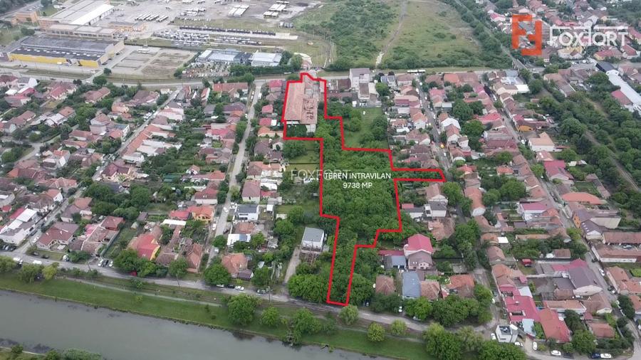 Teren intravilan 9738 mp, cu iesire pe 3 strazi - zona Dambovita - 2