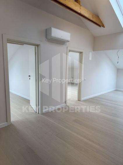 Piata Romana, mansarda boema, finisaje in linii simple si elegante - 4